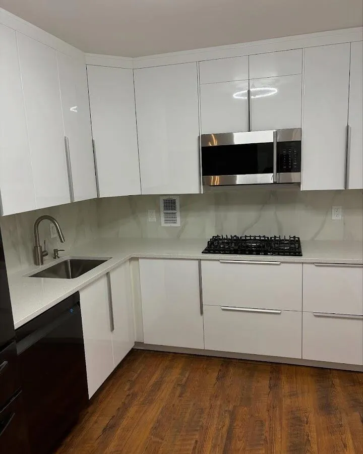 Restored kitchen with white cabinets after water damage in Rosedale